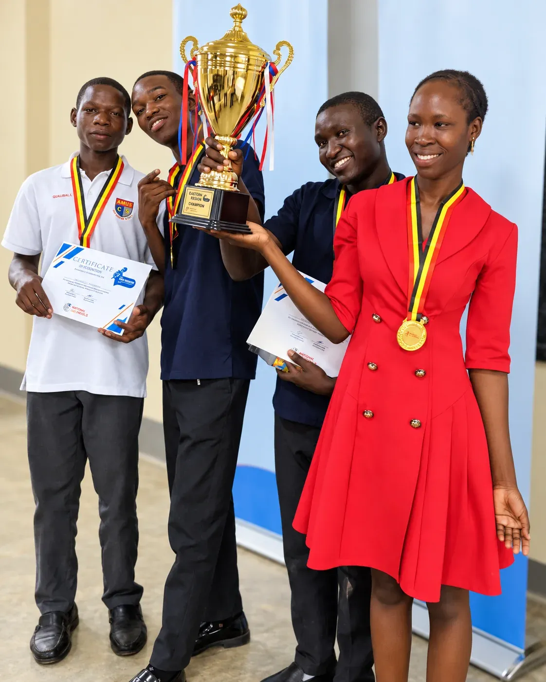Amus College School students celebrating an academic competition championship
