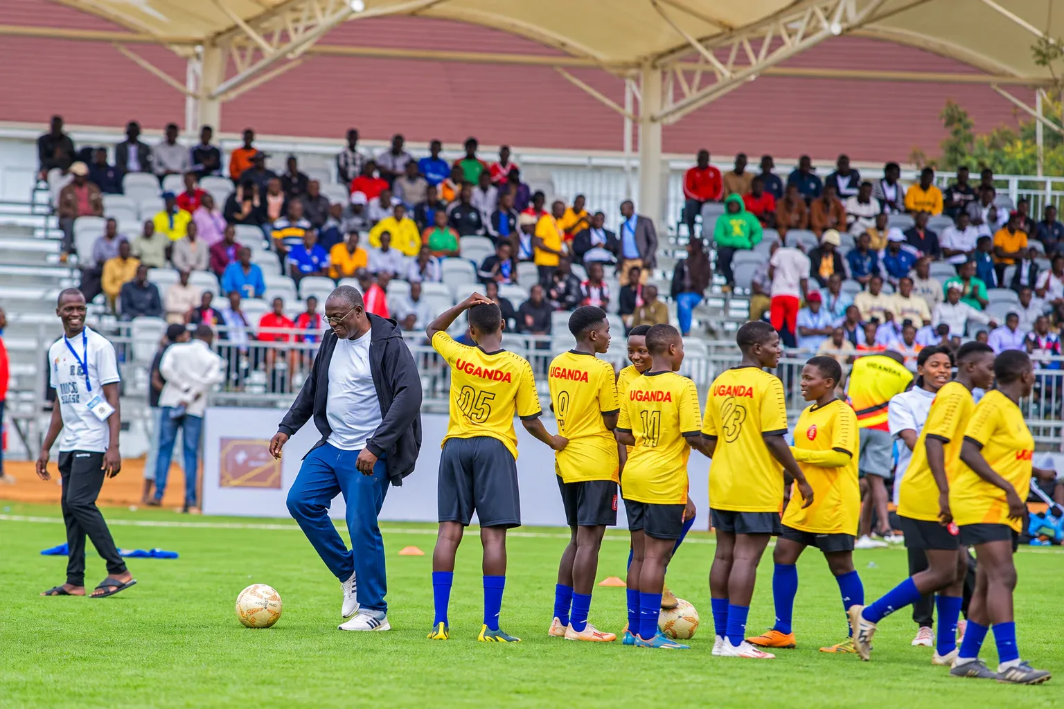 Amus College School students on the football field during a sports event
