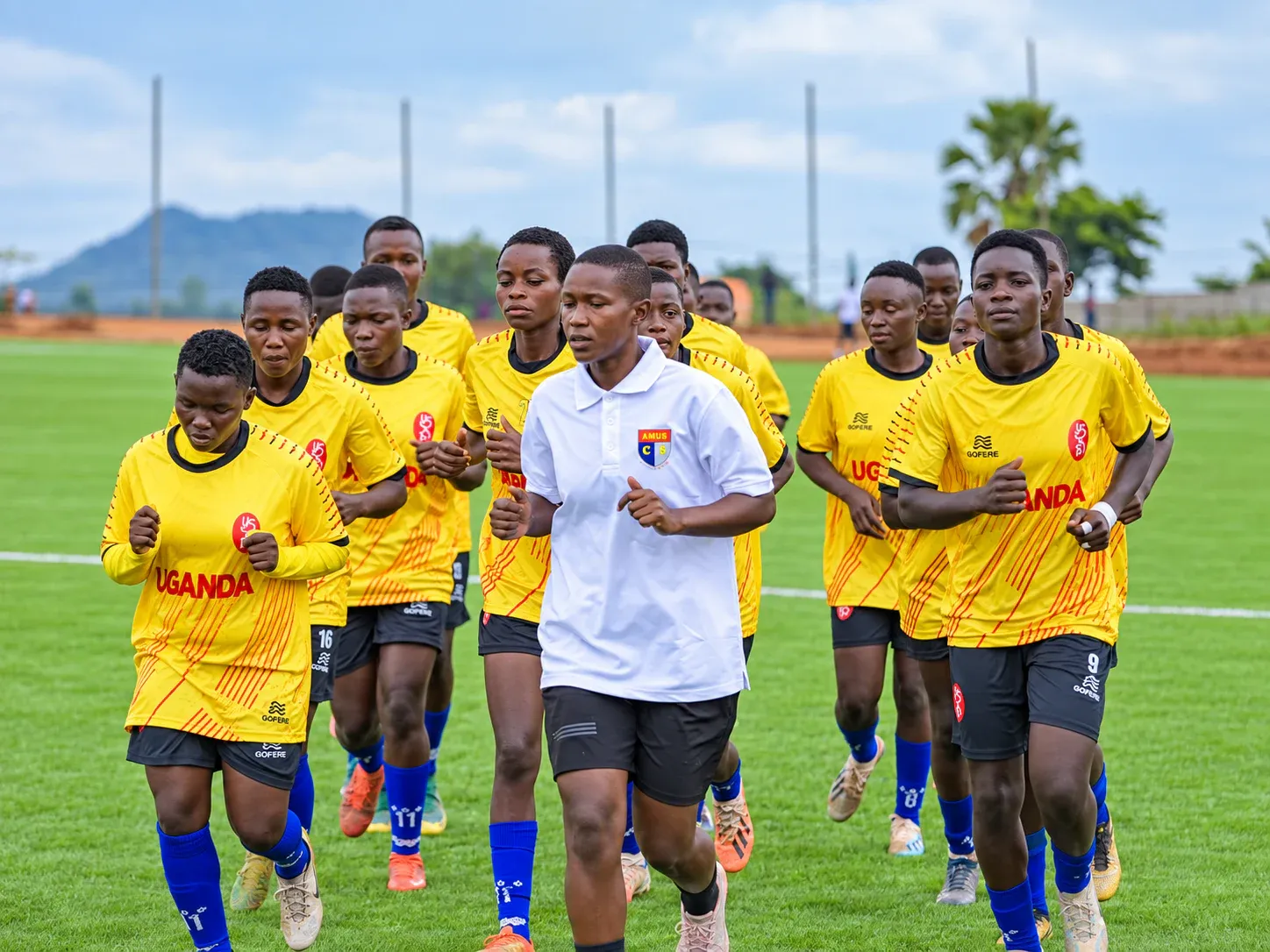 Amus College School football team training together in Uganda jerseys