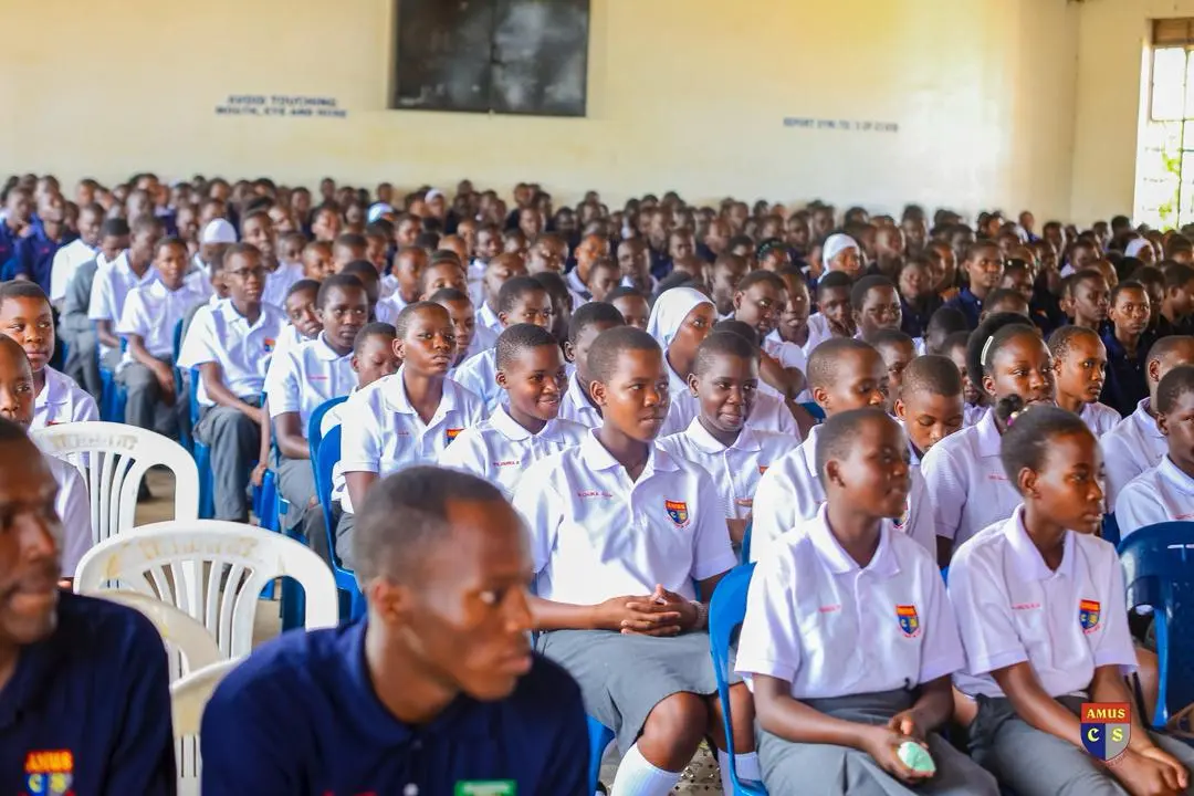 Students in a hall at Amus College